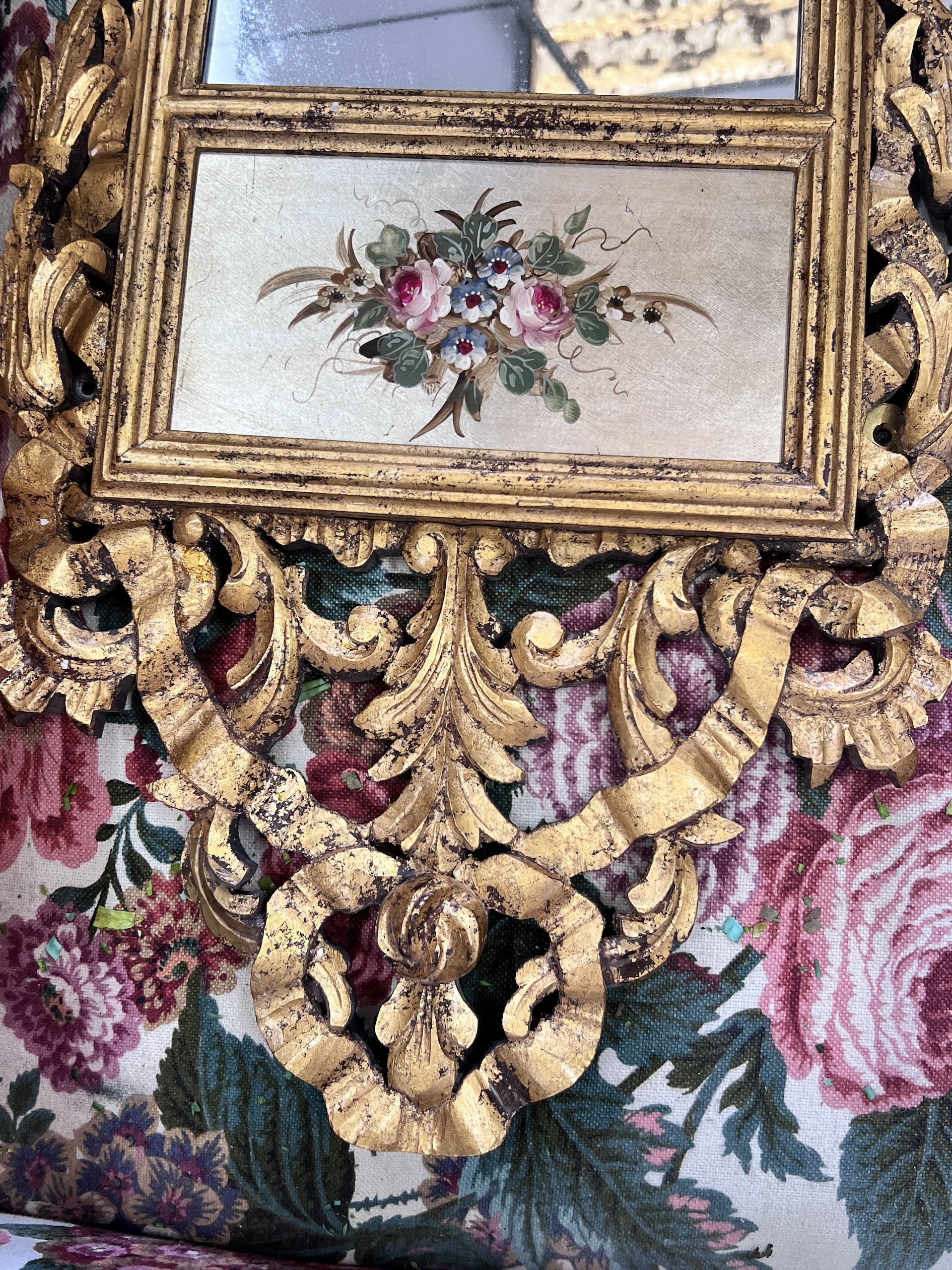 An 18th century style carved giltwood wall mirror, width 44cm, height 112cm